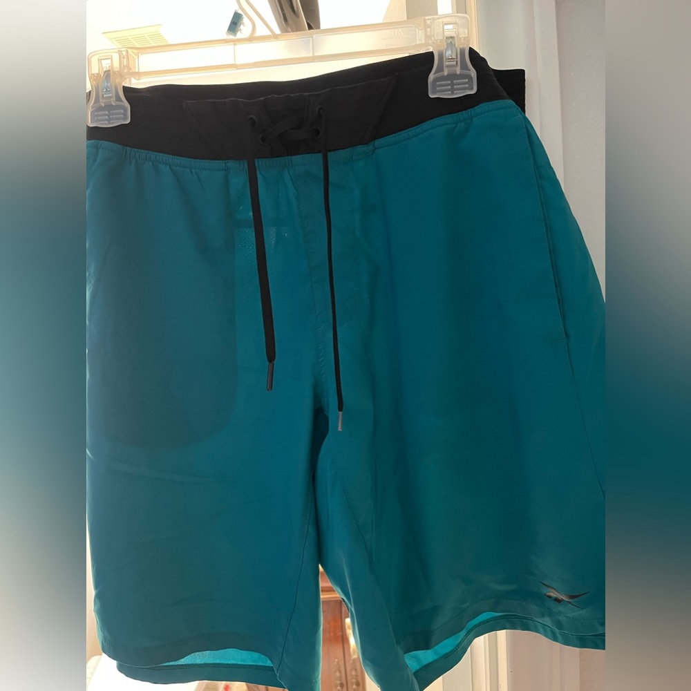 Reebok training shorts. Teal color. Size M.